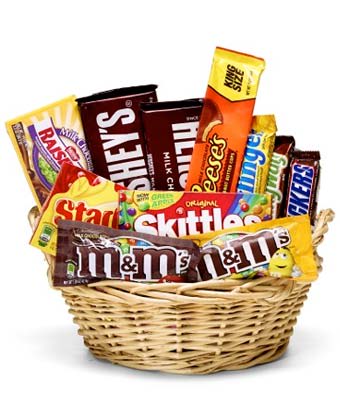 Basket filled with assorted candy bars and chocolates