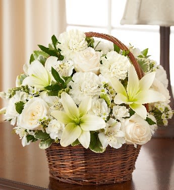 White flowers arranged in a wicker basket