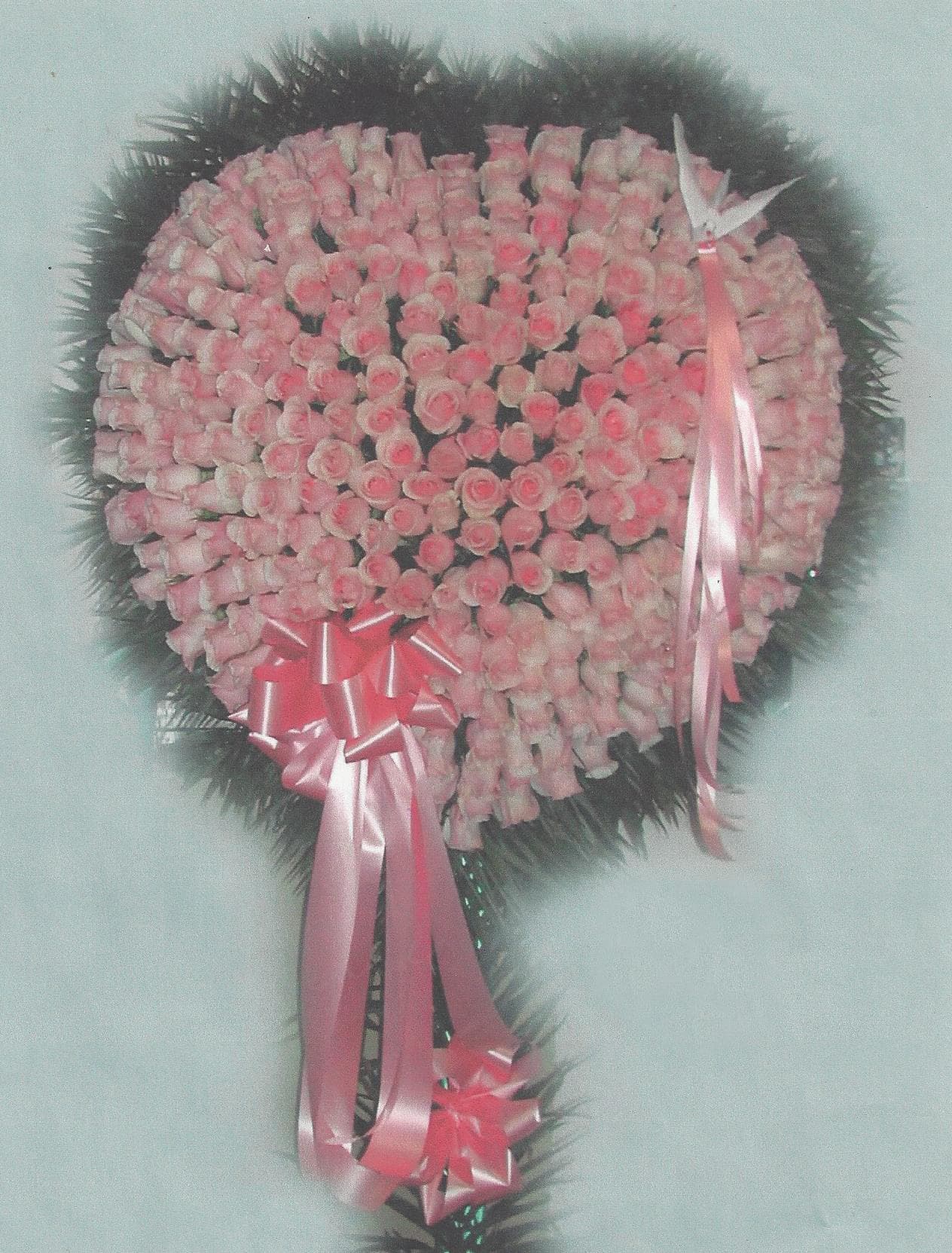 Large pink rose wreath with ribbon bows
