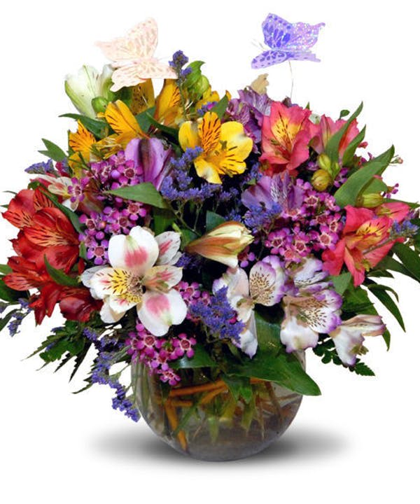 Colorful bouquet of mixed flowers in a glass vase
