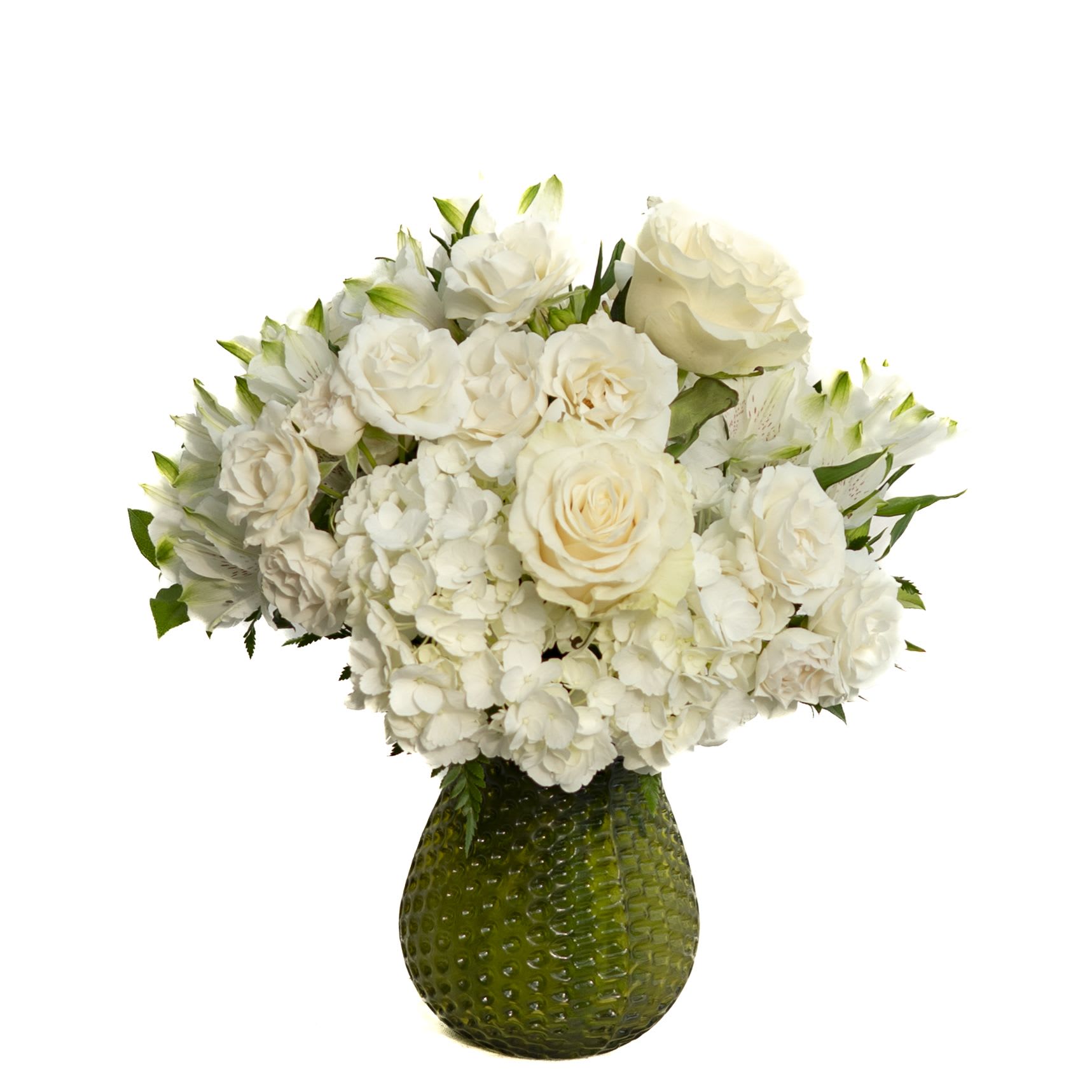 White roses and hydrangeas arranged in a green textured vase