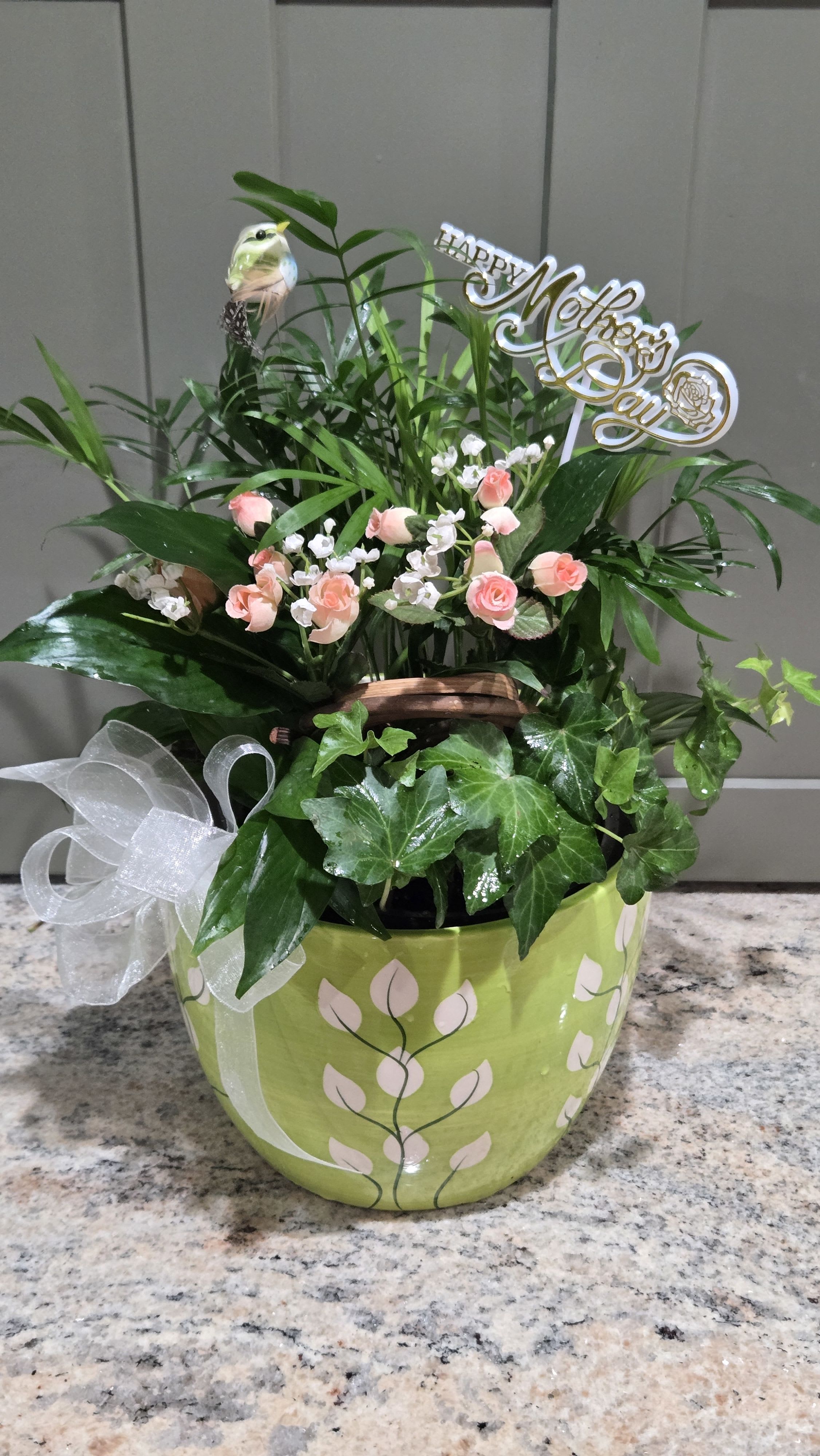 Garden Moments For Mom  - Here's where the indoor planter will surly deliver on a unique gift surprise for any occasion.  (Pick would be changed out for a birthday or getwell, thinking of you, anniversary) The generous ceramic Keepsake container with petite feathered bird, faux mini rose buds &amp; sheer creamy white bow bring the moment in the garden all together. Easy care, long lasting with TLC the live plants will grow to maturity in year or so. Ready for repotting or leave as is.