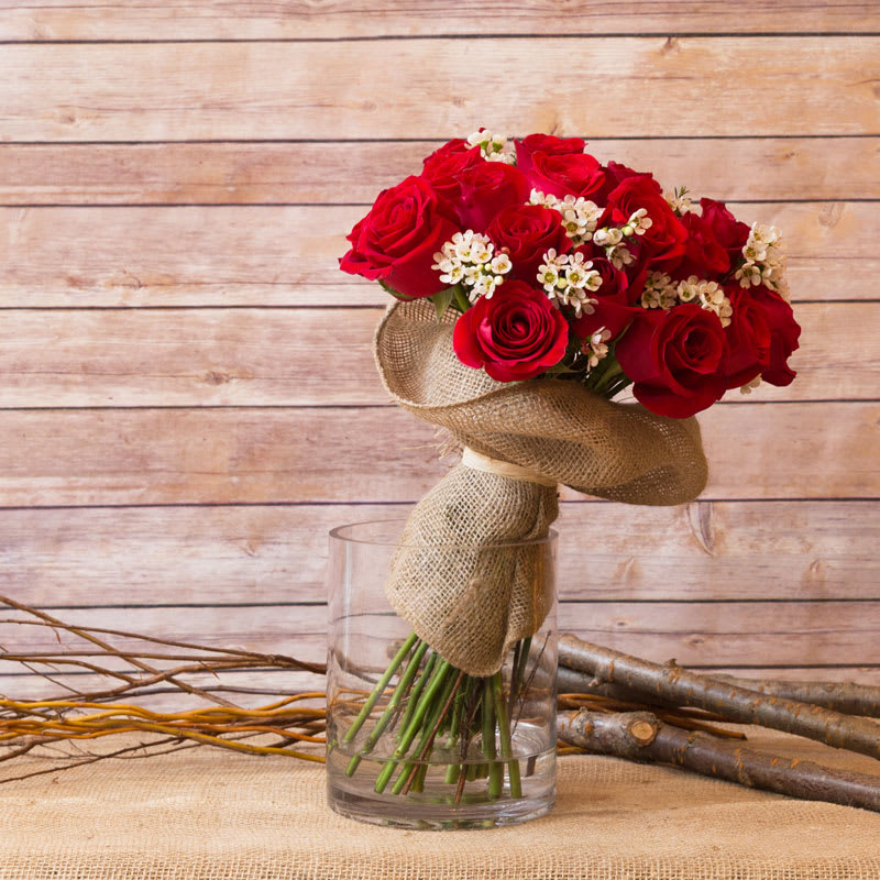 AMOUR  - We are pleased to highlight our exquisite collection of long-stemmed roses, expertly arranged by Flowers by Philip. These classic arrangements, accented with seasonal foliage, are available in three stunning options:  * **Standard Version:** Dozen long-stemmed roses  * **Deluxe Version:** Dozen and a half long-stemmed roses  * **Premium Version:** Two dozen long-stemmed roses   For a truly unforgettable gift, choose the timeless elegance of long-stemmed roses by Flowers by Philip.