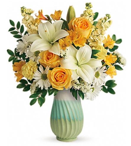 Springtime Bouquet - Nothing says spring like this artistic gift, pairing a sunny yellow bouquet with the fresh greens of this hand-glazed, glossy stoneware vase. This colorful mix features yellow roses, white asiatic lilies, yellow alstroemeria, light yellow carnations, light yellow stock, white daisy spray chrysanthemums, white sinuata statice, and huckleberry.  Orientation: One-Sided