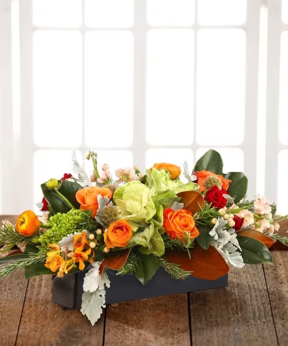 Harvest Centerpiece - From farm to table, this autumn delight features fresh green and white kale or antique hydrangea, Italian ranunculus, tangerine roses, garden stock, hypericum berries, rosemary, silver dusty miller and southern magnolia artfully designed in our French Country garden box.  Orientation: All-around.