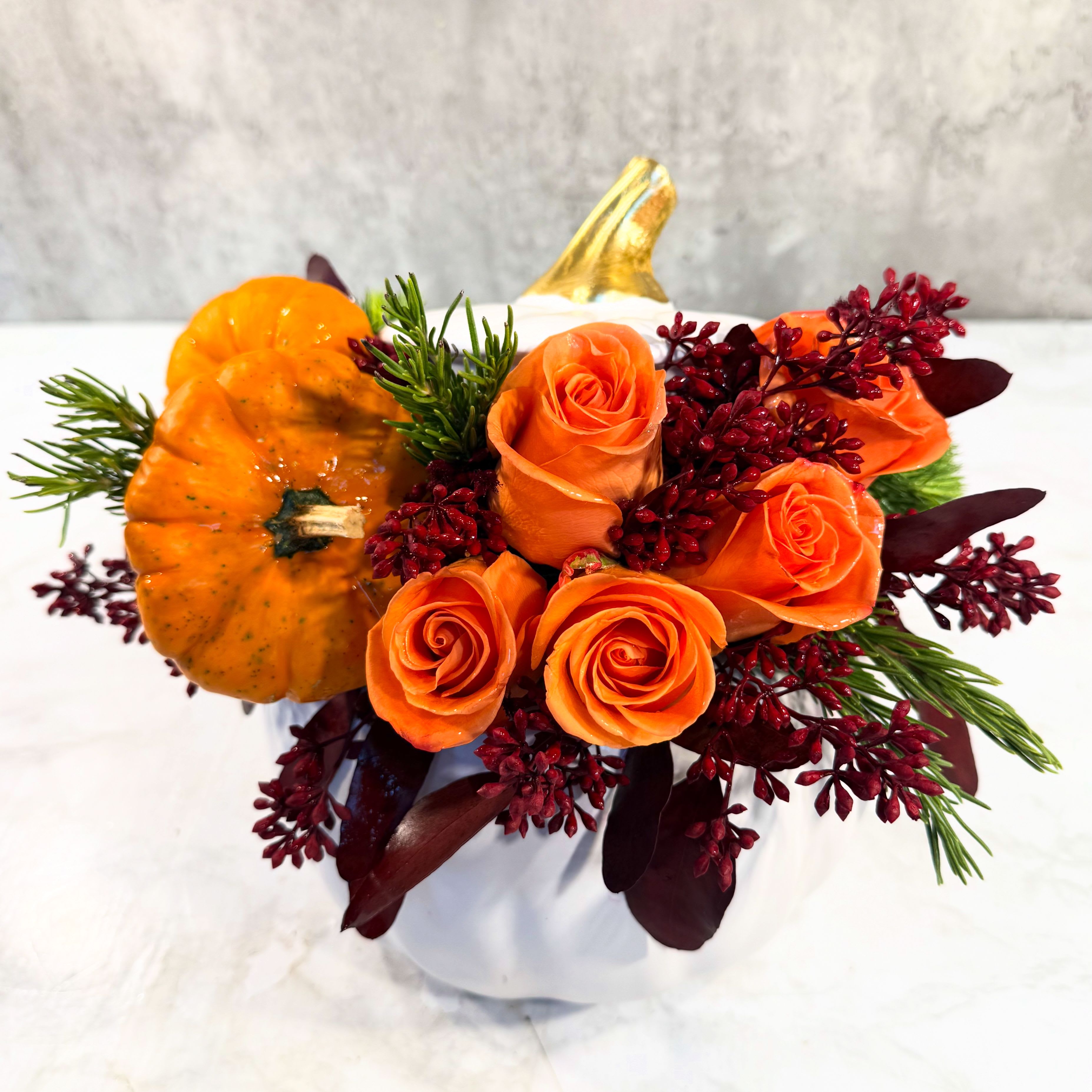 HARVEST - Limited availability. An autumnal collection of rich colors, textures, designed in a reusable white ceramic pumpkin vessel.  Each one unique, but always designed within the same color palette. 