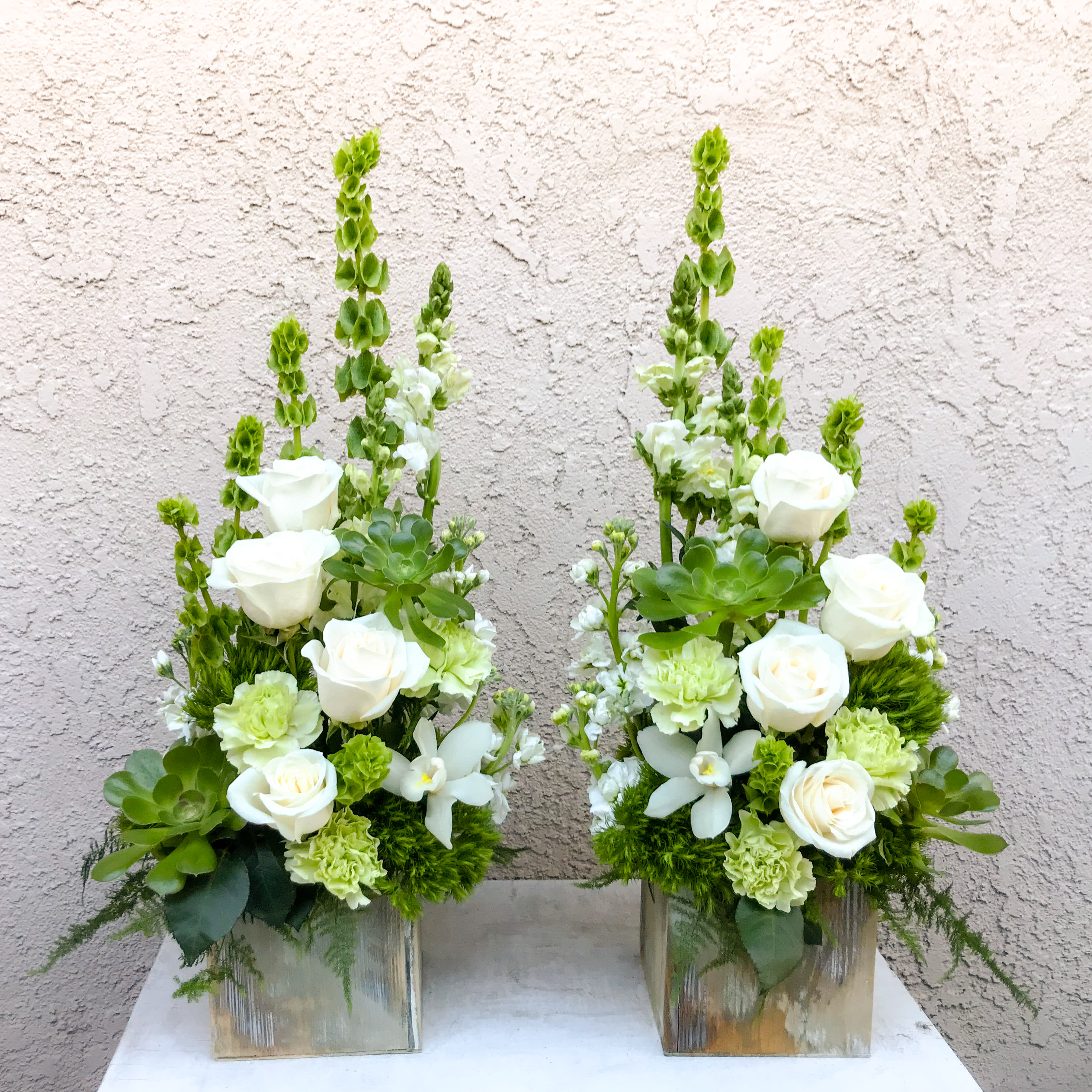 Green gardens - These arrangements are perfect to decorate the ends of tables or adding beauty to photos you may have placed in between them.   (approximately 30"H x 12"W
