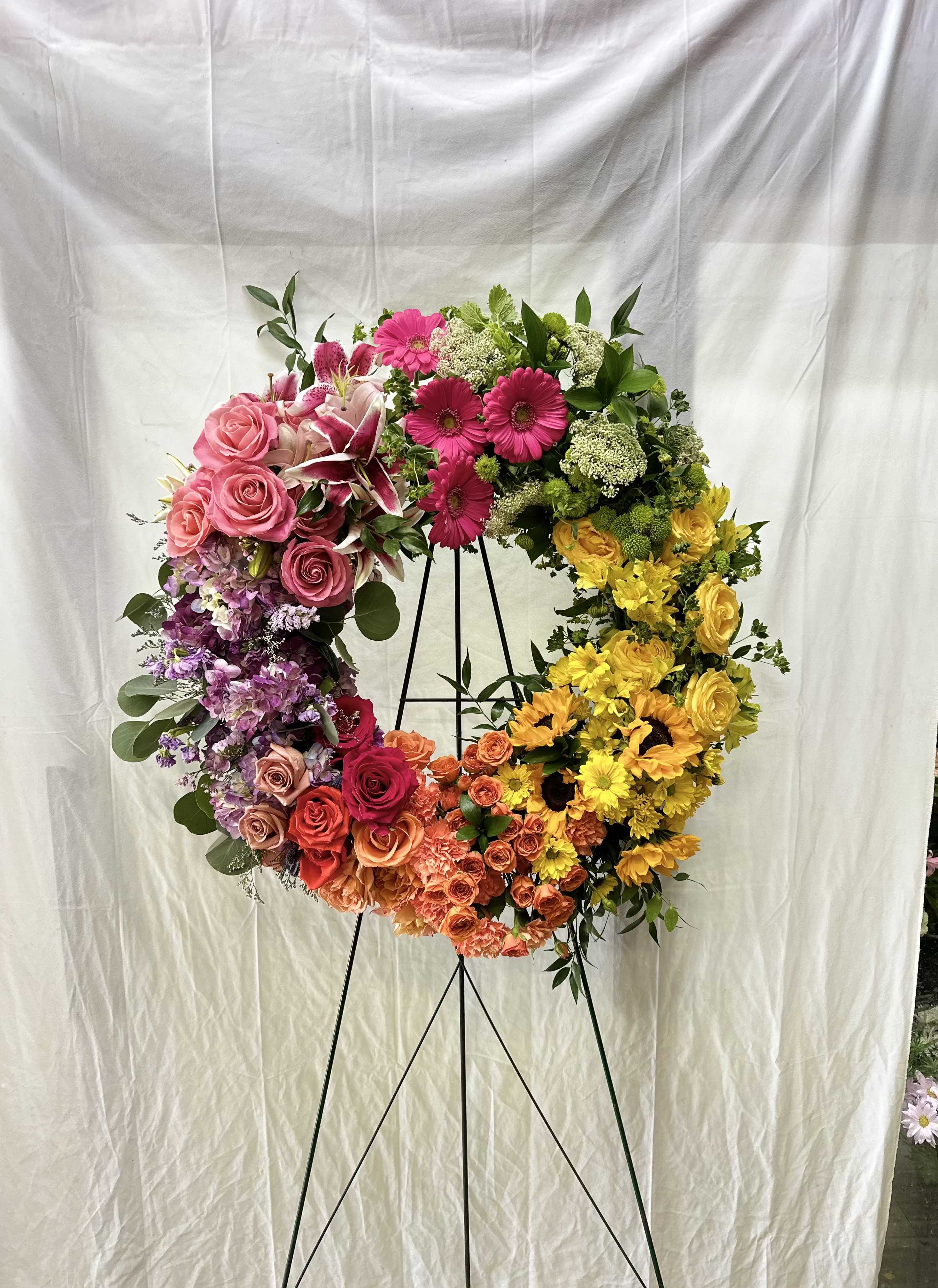 Circle of Serenity Wreath (Deluxe Shown) - A classic wreath representing eternal life and unbroken love.