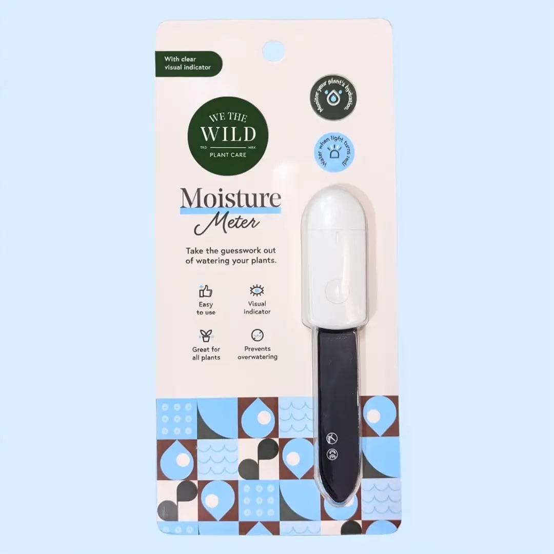 Plant moisture meter in retail packaging with a white probe and black handle