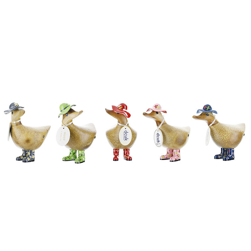Five decorative duck figurines wearing colorful hats and boots