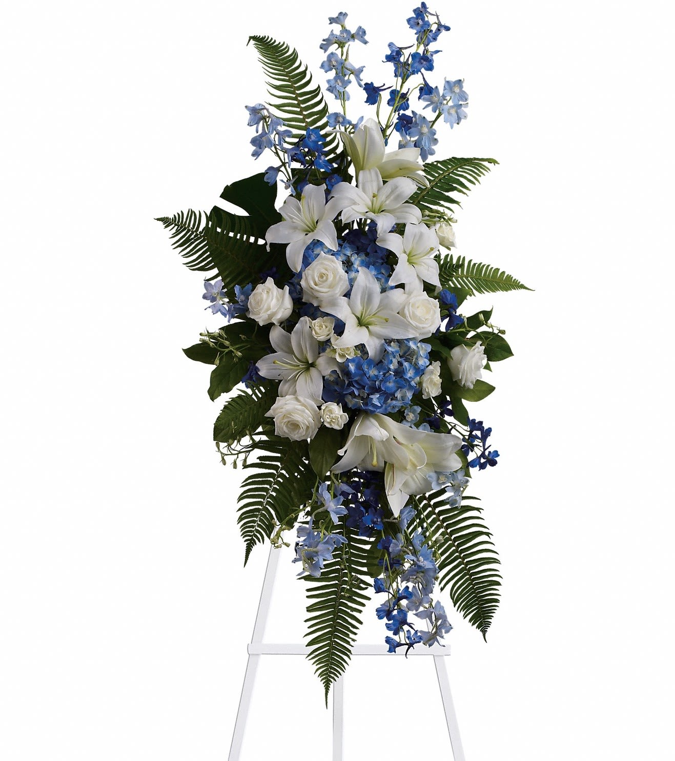 Tall white and blue floral standing spray on an easel
