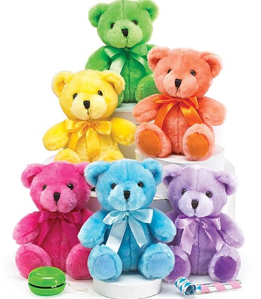 Five colorful teddy bears with ribbons on white stands