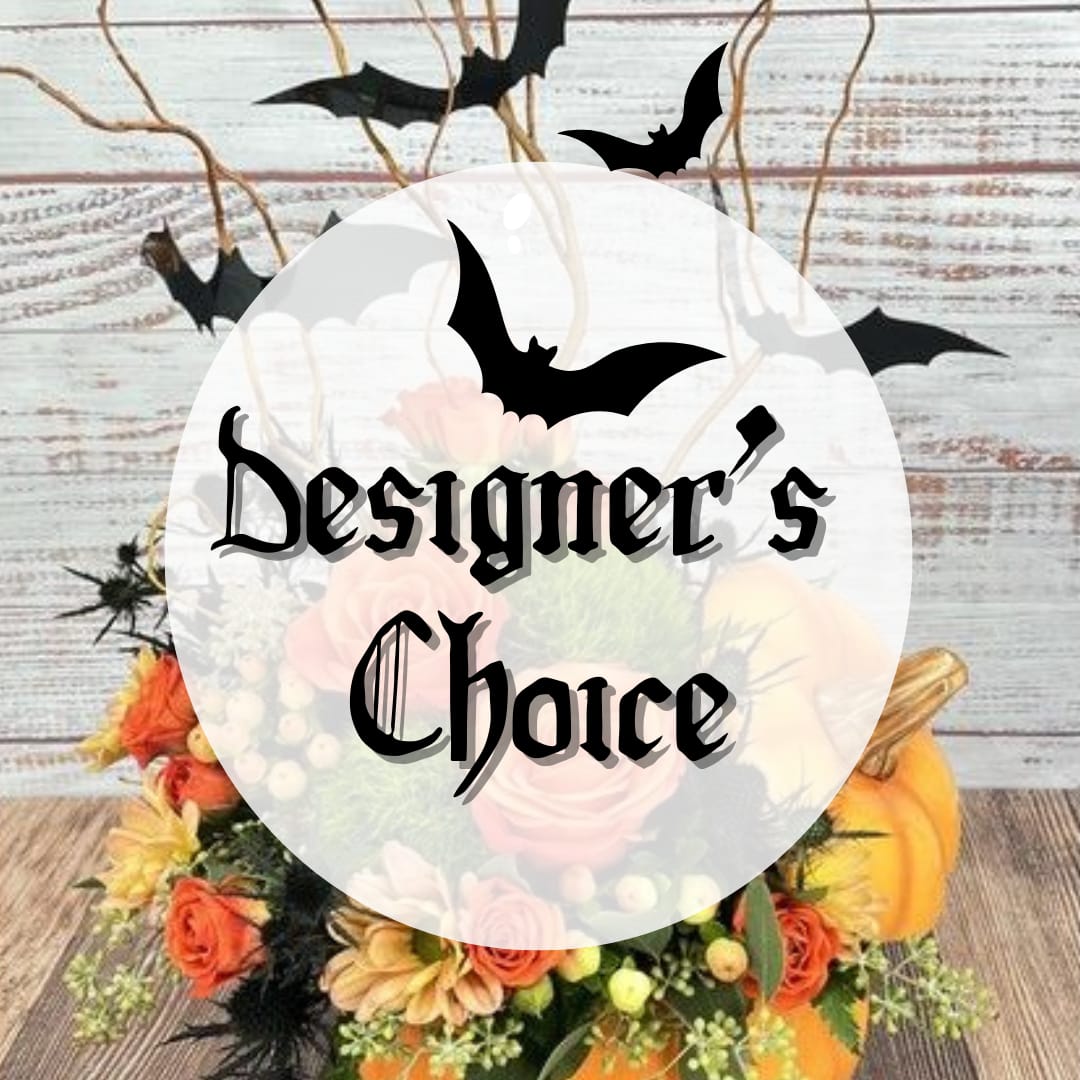 Halloween floral arrangement with pumpkins and bats