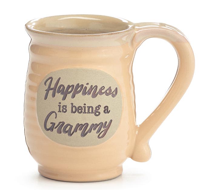 Beige ceramic mug with the phrase 'Happiness is being a Grammy' printed on the front.