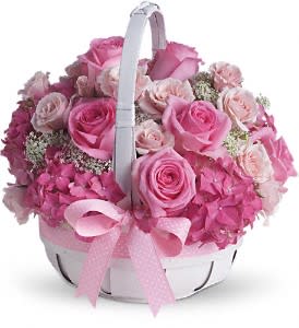 perfect pink - Thank heaven for little girls! And for adorable arrangements like this one! Perfect for new moms, new babies and girly-girls of all ages, this sweet basket of pink petals is sure to get a warm welcome!  Pretty pink hydrangea, roses and spray roses along with Queen Anne's lace are delivered in a charming white basket that's all wrapped up with a pink bow. Say hello to beauty, cutie!  Approximately 11 1/2" W x 12" H  Orientation: All-Around