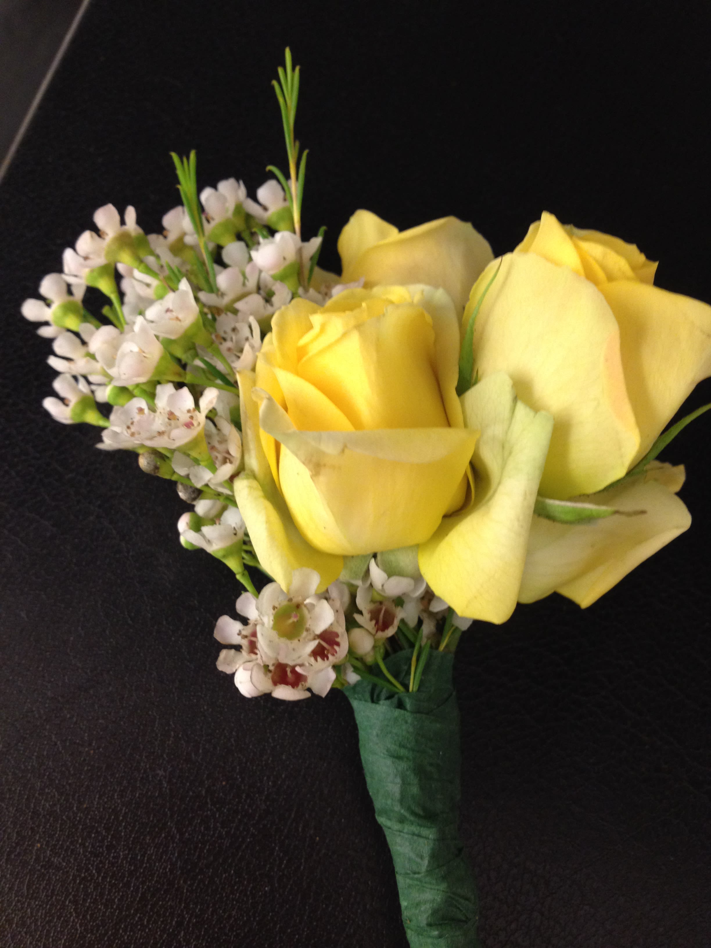 Yellow rose bouquet with small white filler flowers