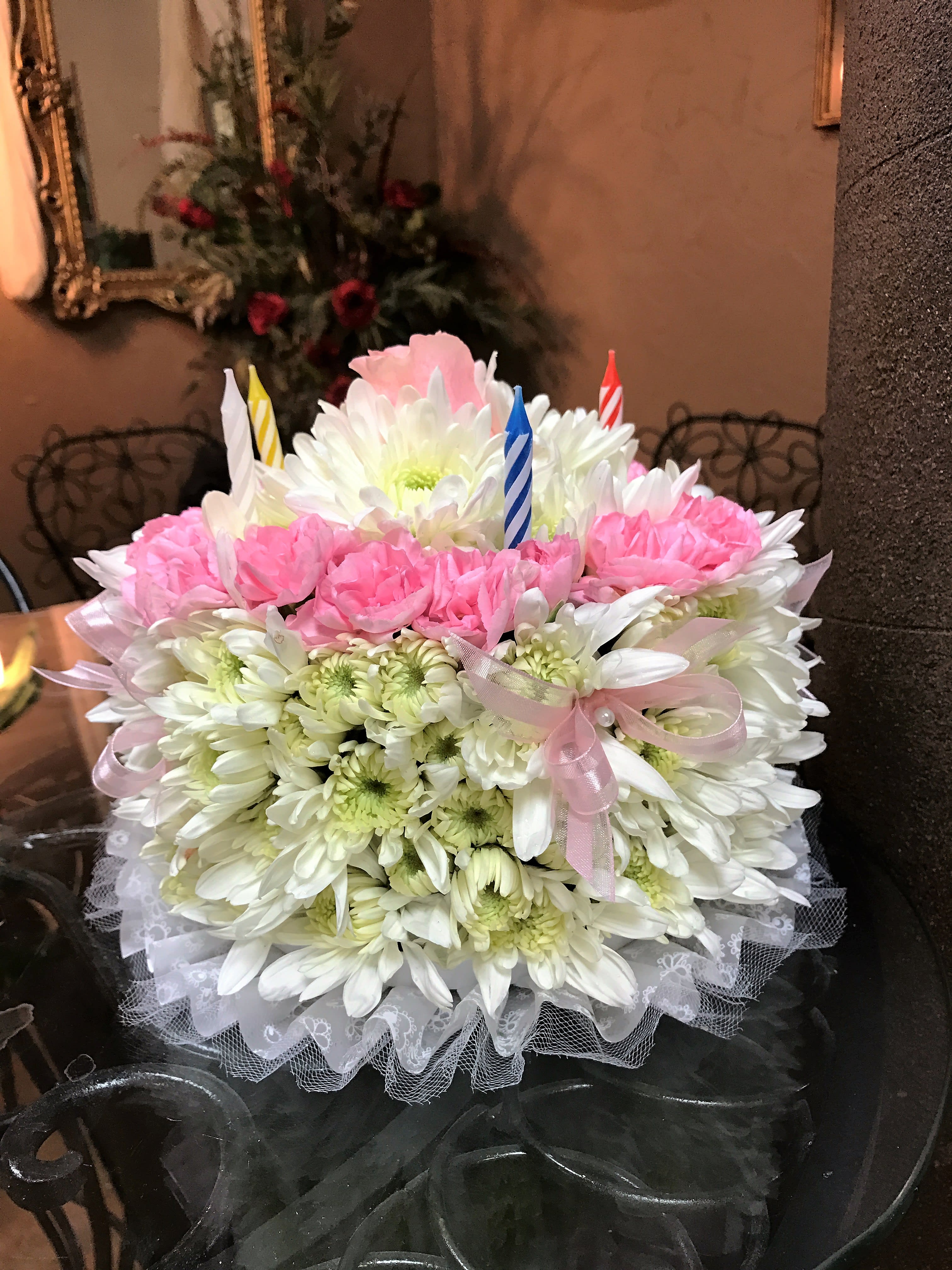 How Many Candles - White cushions, Pink mini corns, etc