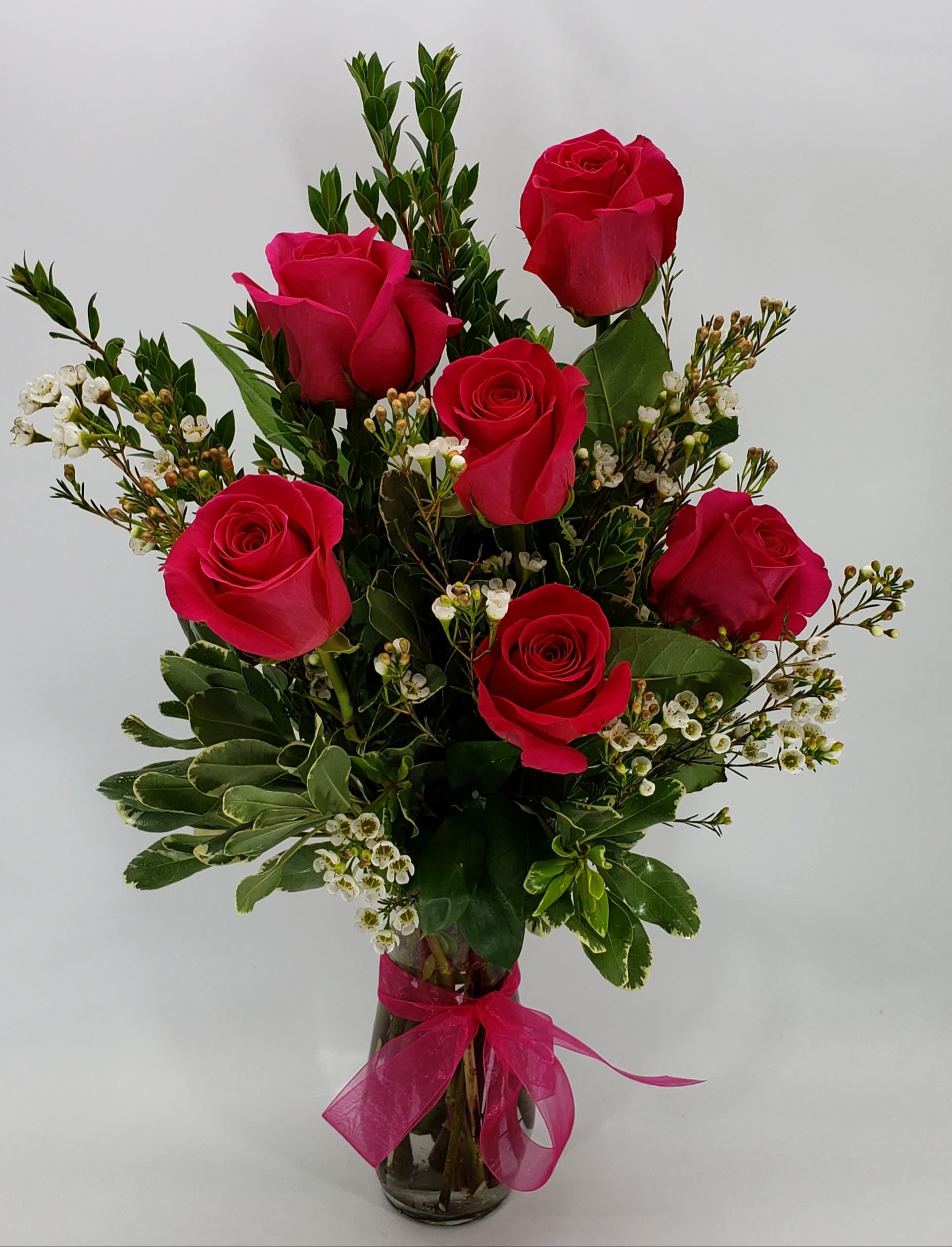 Pink Roses By Six - Pink roses and love or whatever you feel. Opens large and are long lasting. Approximately 20 inches tall.