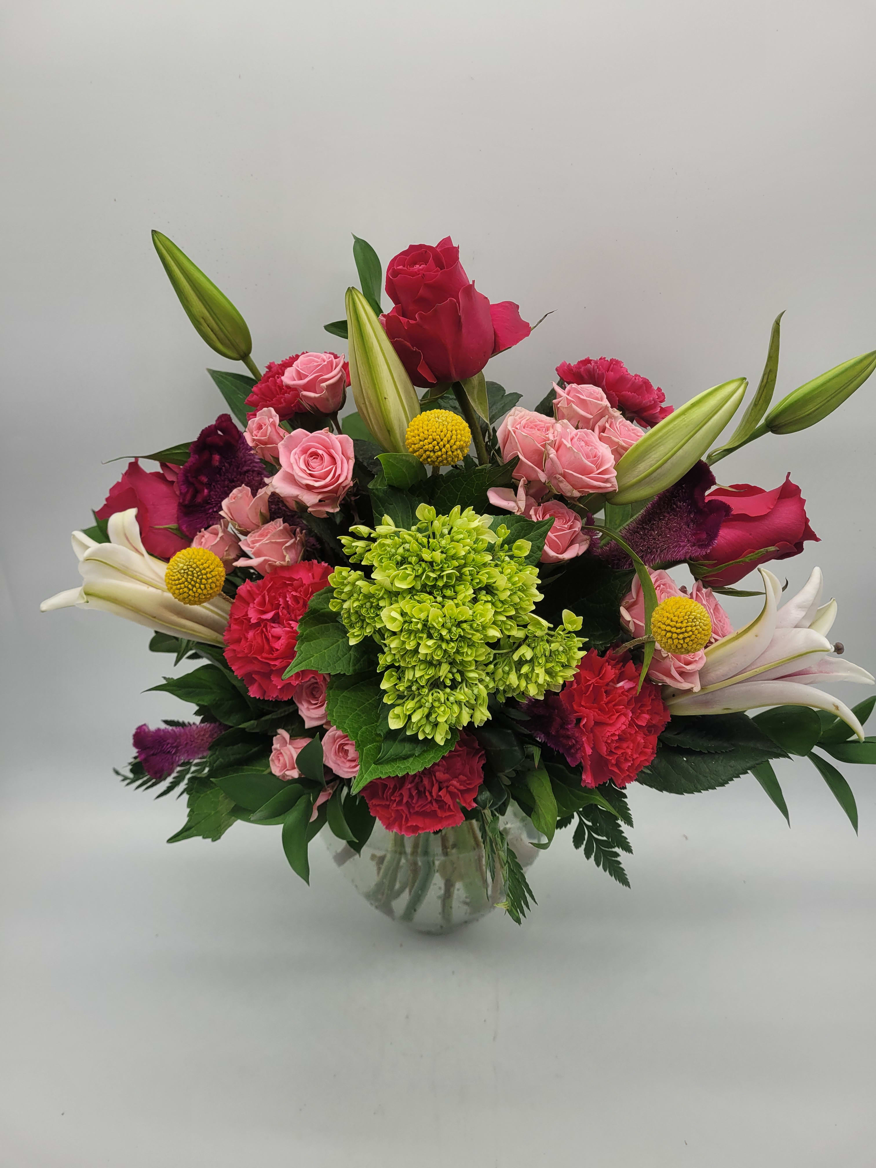 From The Heart  - A mixture of premium flowers artfully arranged for perfect gift giving. Long lasting and fragrant.