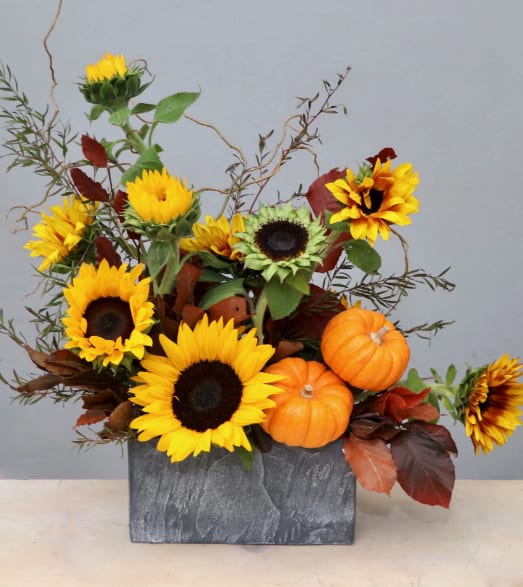 Sunflower Harmony Special - WeHo - With bright sunflowers and seasonal accessories, this arrangement stands at approximately 12-14 inches tall in the standard size. Make sure to upgrade for even more beautiful blooms!