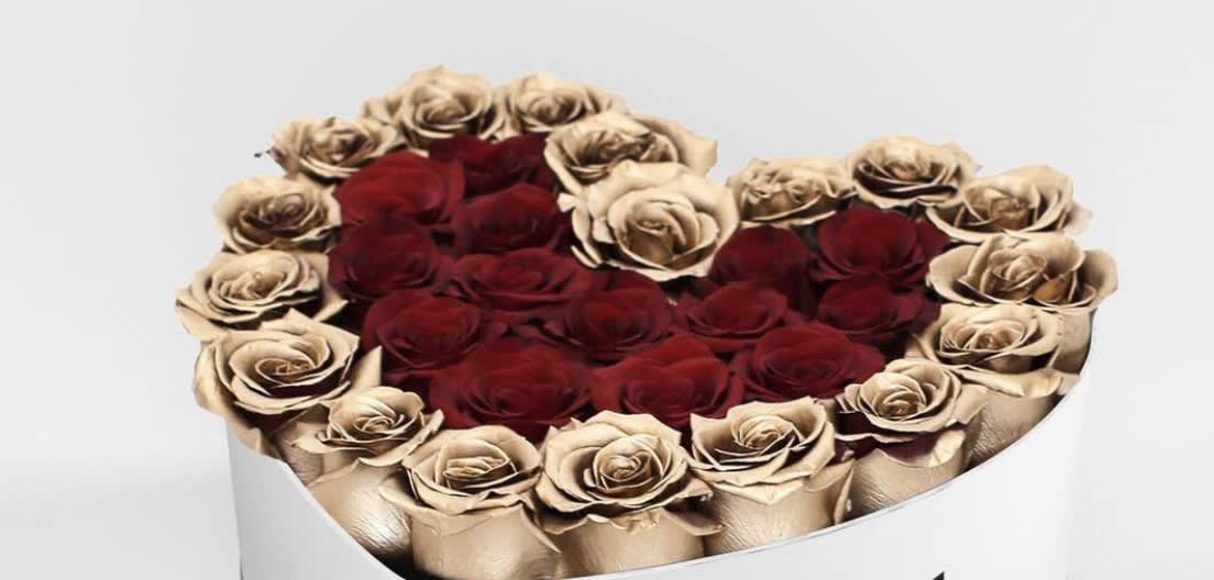 Heart of Gold - a beautiful heart shaped box carefully crafted with gold roses and red roses. Elegant, beautiful and timeless. *can be made with other color of roses just specify  