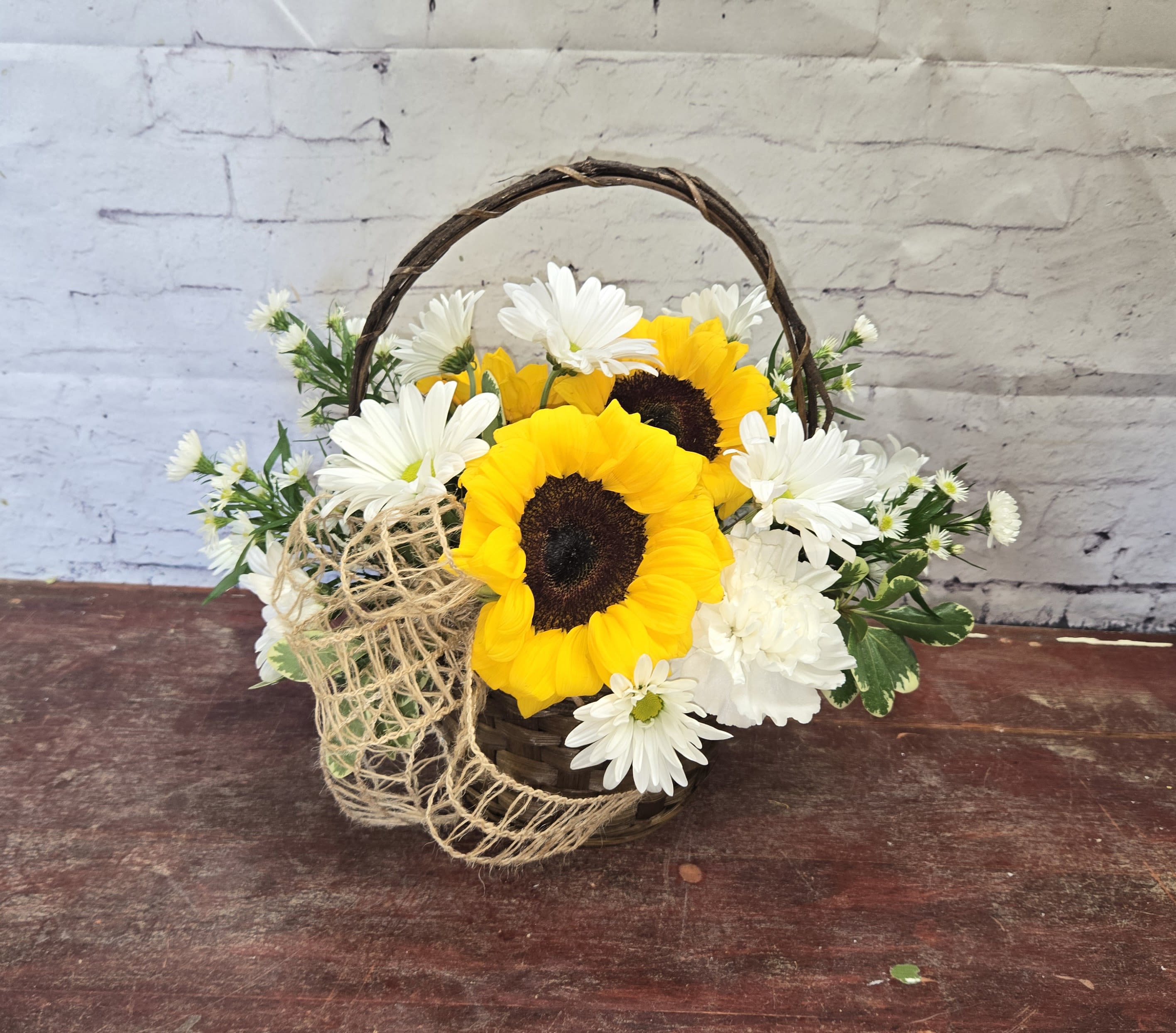 Farmhouse Charm - Basket of sunflowers and daisies. Simple and beautiful.  
