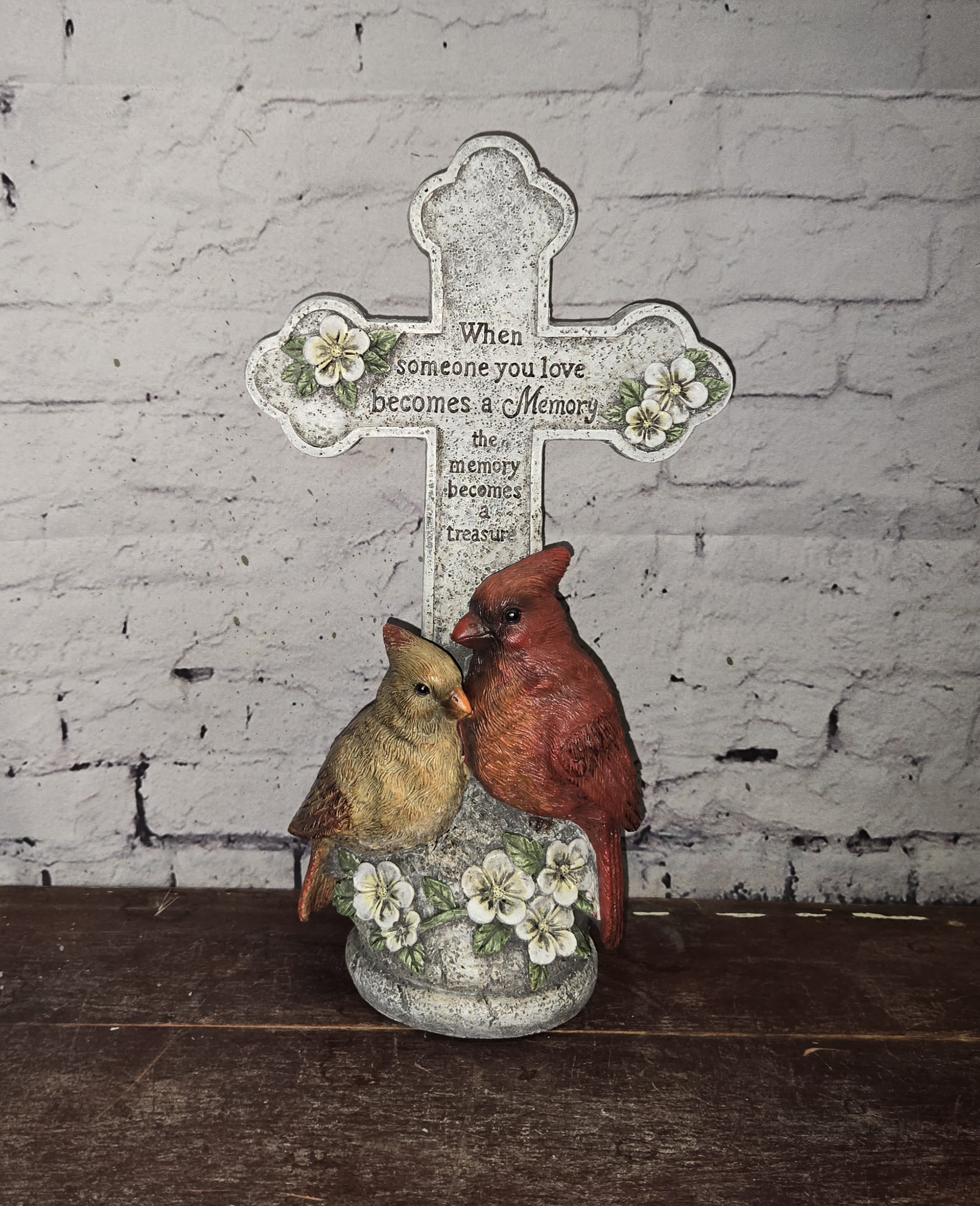 Decorative memorial cross with two birds and floral accents