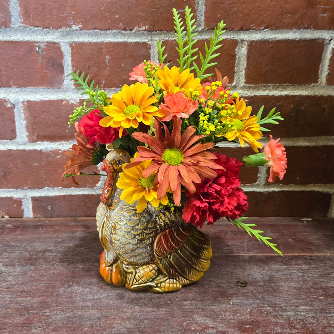 Mixed bouquet in a turkey-shaped ceramic vase