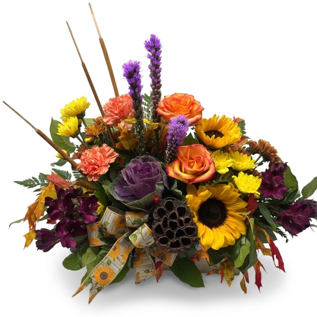 Autumn bouquet with sunflowers, roses, carnations, and purple flowers