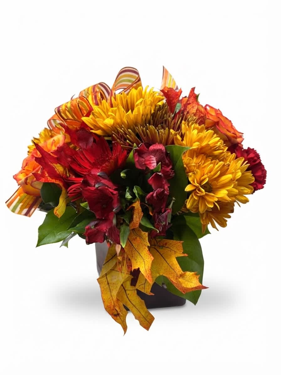 Autumn bouquet of yellow and red flowers in a dark vase