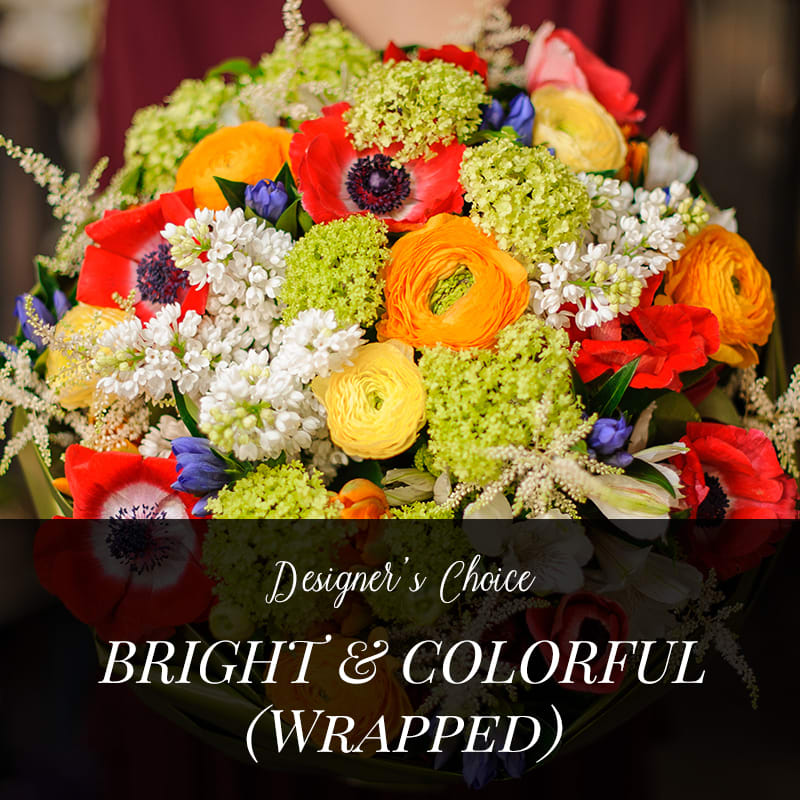 Bright mixed bouquet with red, orange, yellow, and white flowers
