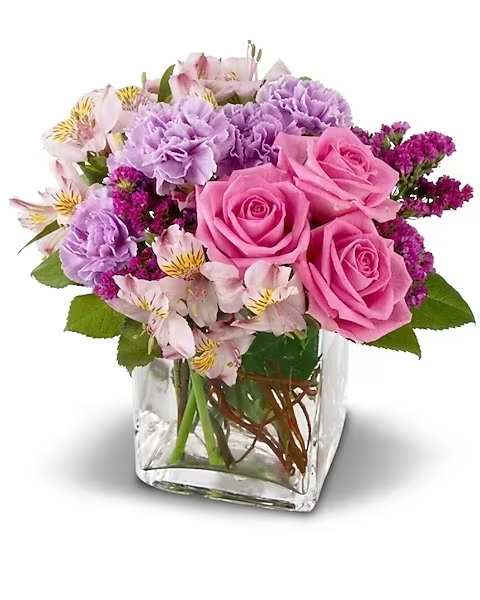 Pastel Gaze - This pastel cube arrangement is the perfect and most popular combination of soft blooms to add comfort to any environment. Let these flowers convey your love, care, kindness and or sympathy for any moment. This petite compact arrangement is the perfect gift for any occasion. This cube arrangement includes, roses, carnations, alstroemeria, and statice. 