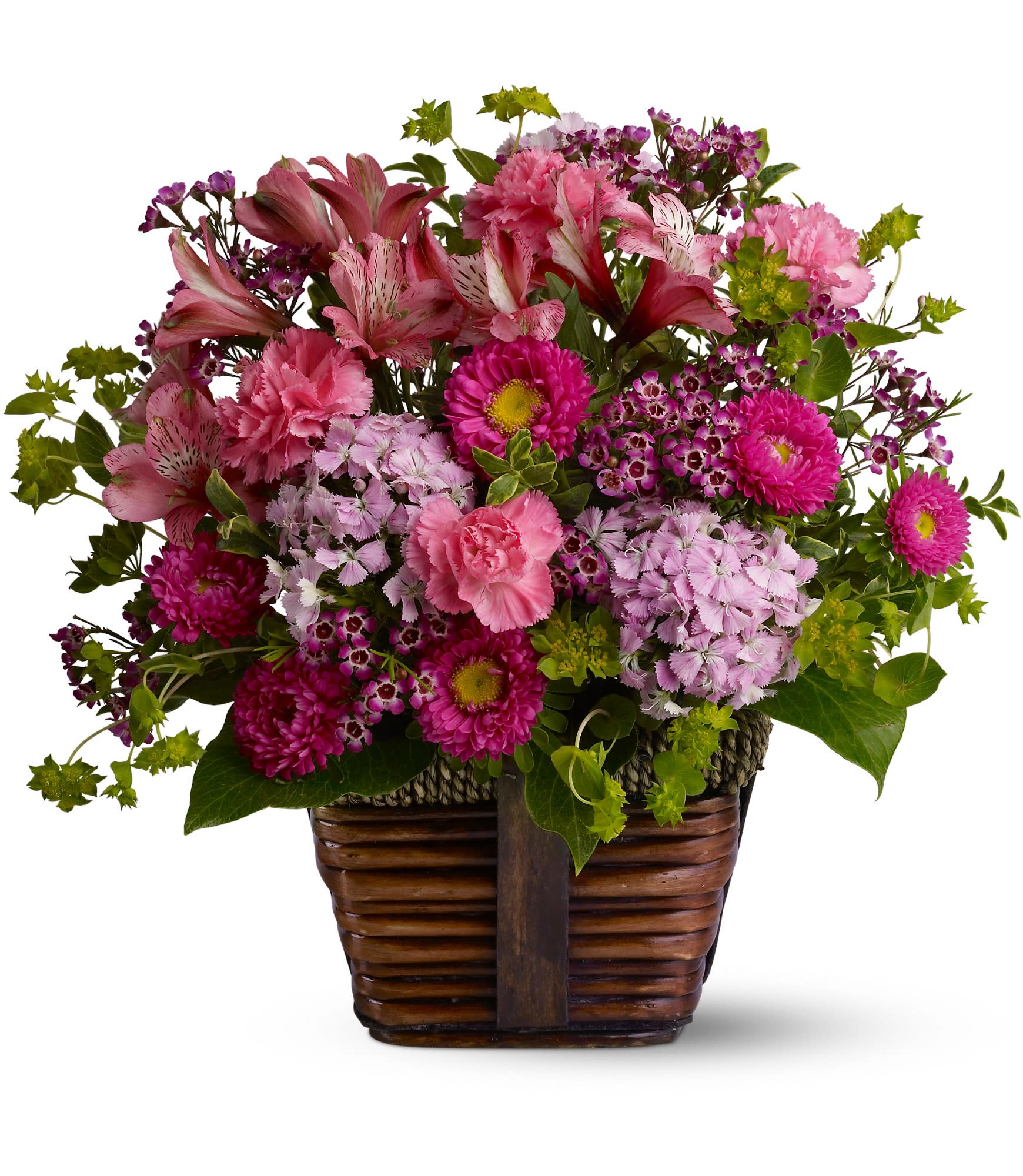 Pink and purple mixed flower arrangement in a wooden basket