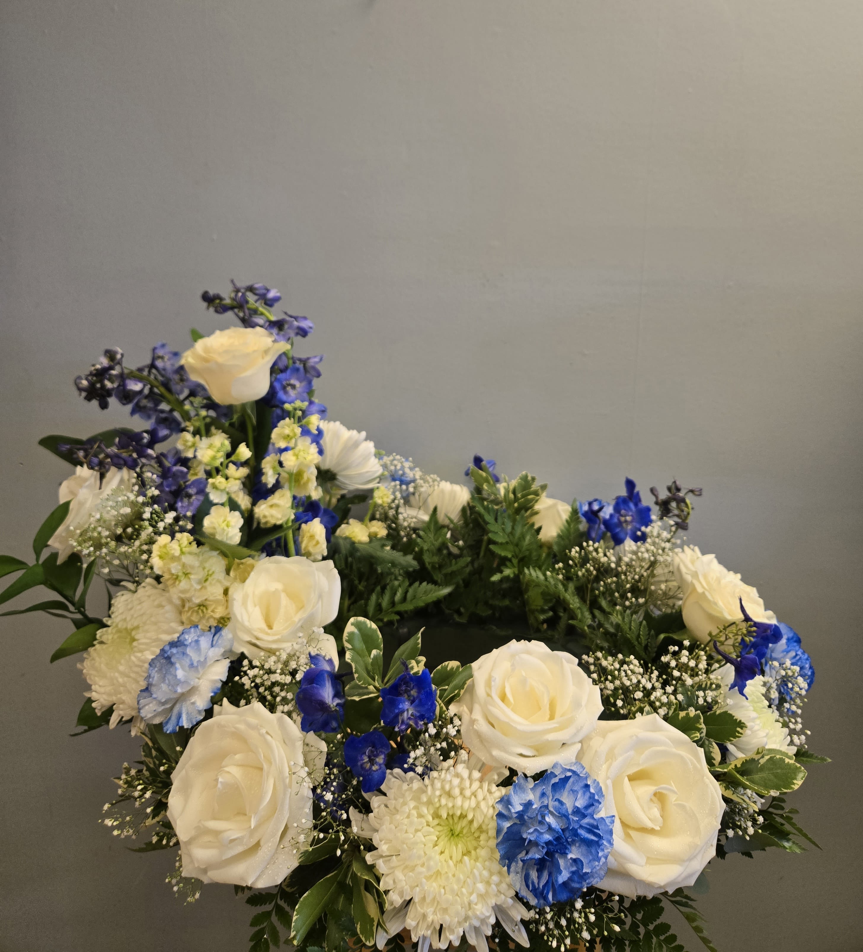 Ocean of peace - Thoughtfully arranged to comfort the person you're honoring, this piece conveys sympathy and calm without feeling ornate-an elegant way to say you're thinking of them. Order with delivery for a service date; the flowers arrive ready to display and benefit from cool, shaded placement and regular misting to keep the blooms fresh.