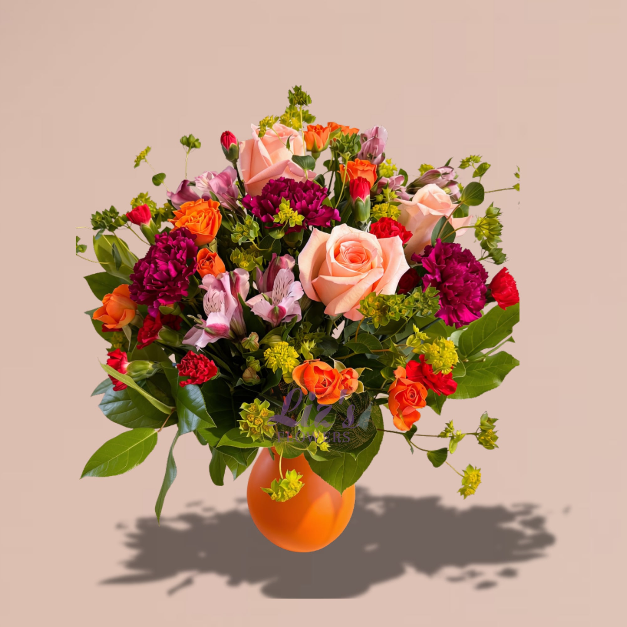 Mixed bouquet of roses, carnations, and alstroemeria in an orange vase