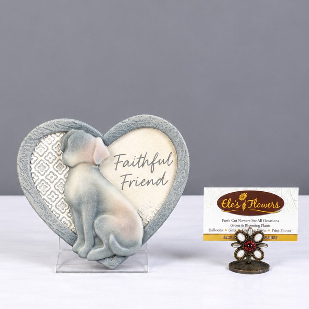 Heart-shaped dog figurine plaque with the words Faithful Friend