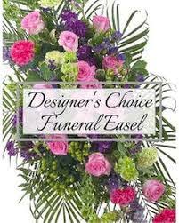 Colorful funeral easel spray with pink and purple flowers