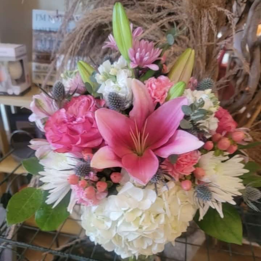 Pink lily bouquet with white hydrangea and mixed blooms