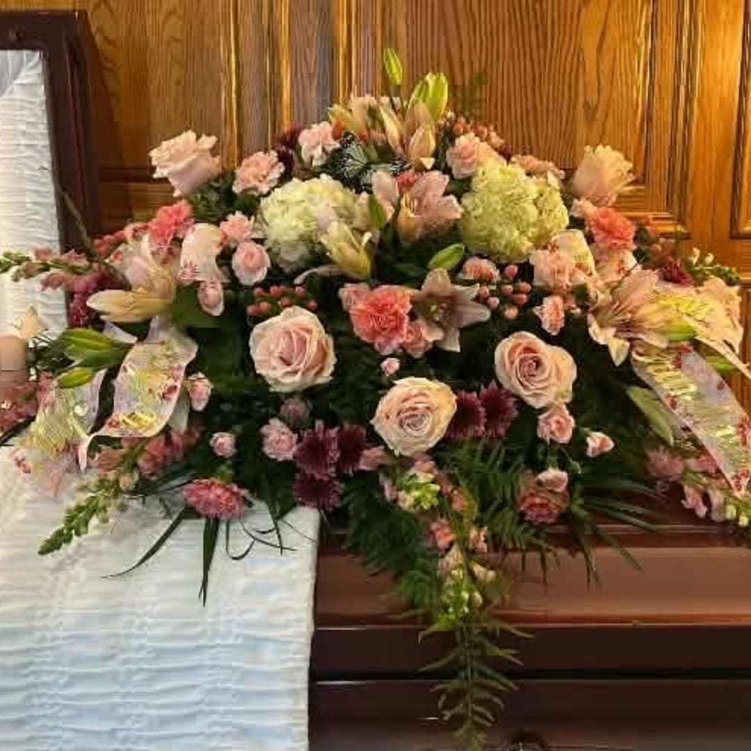 Large pink and cream floral spray with roses and lilies