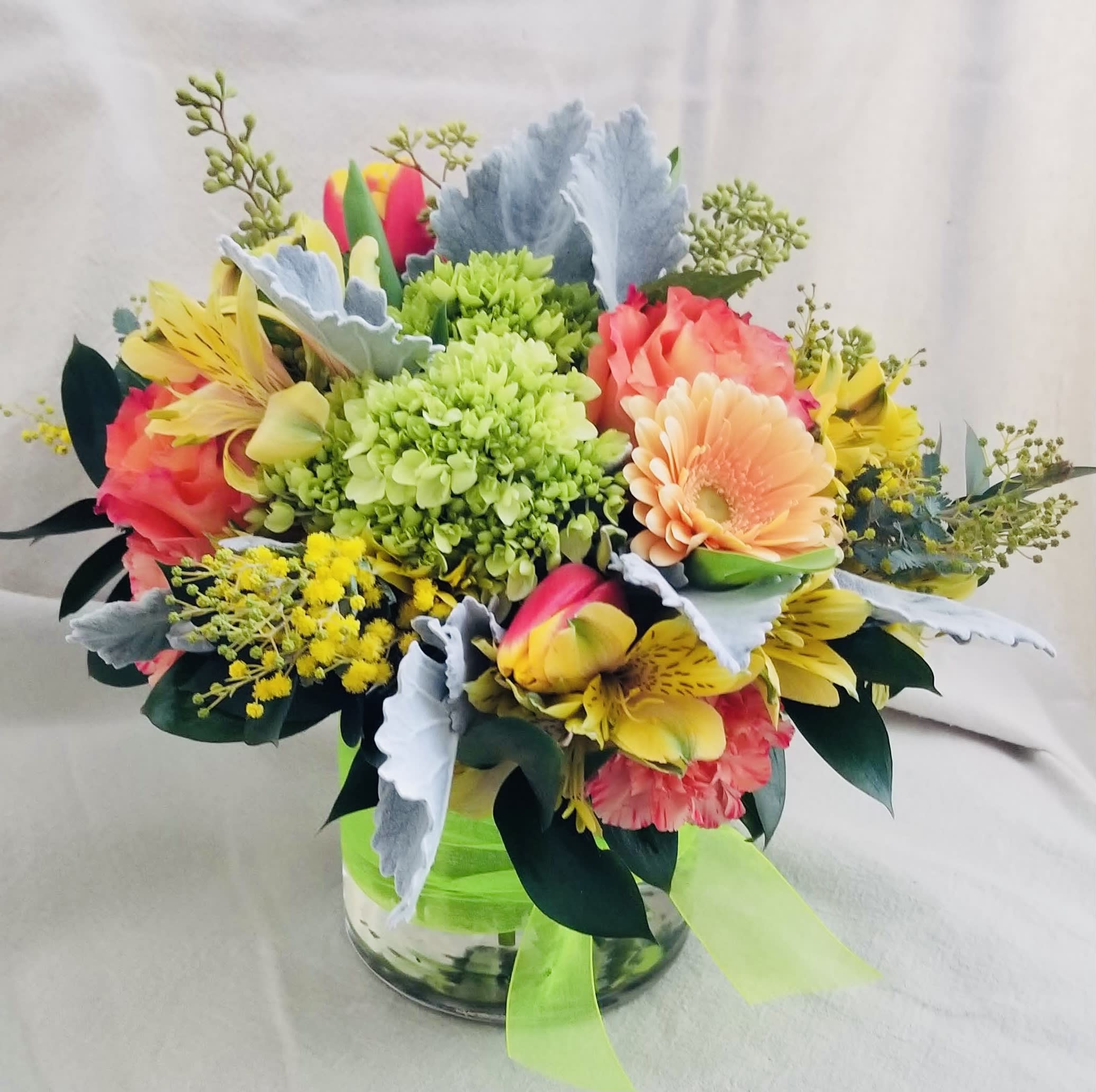 Citrus colors - A mix of orange, yellow and lime green flowers