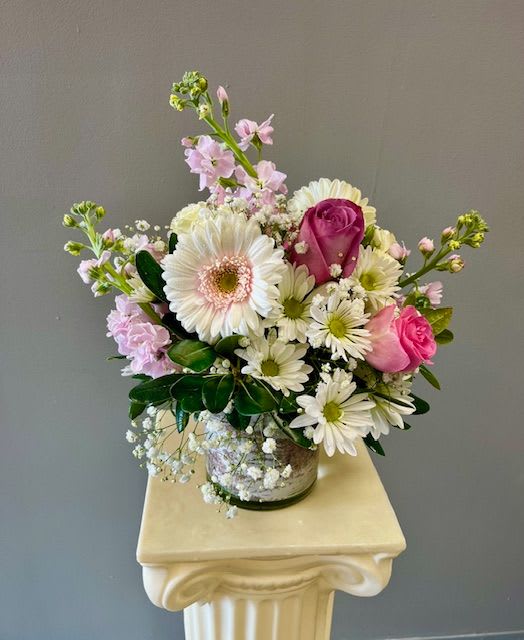 Pink and white mixed bouquet in a glass vase