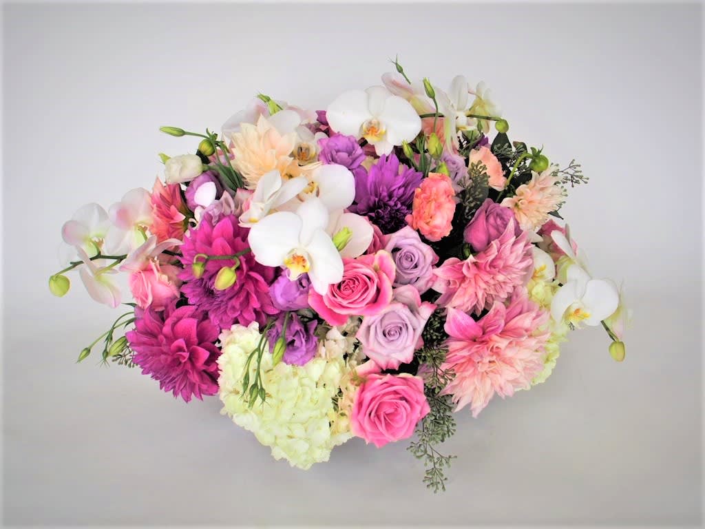 Mixed bouquet with pink, purple, and white flowers