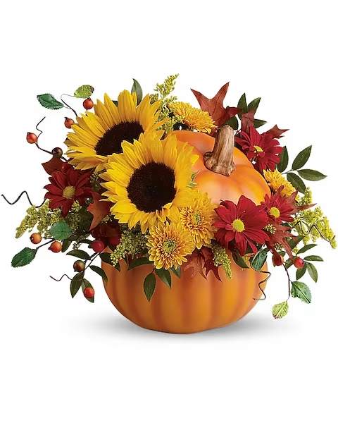 Pretty Pumpkin Bouquet - Rustic autumn flowers are stunning in a hand-painted ceramic pumpkin that looks like it just came from the patch. What a truly gorgeous gift for somebody special. They'll love it year-round - for flowers, candy or just to admire.  The radiant bouquet includes yellow sunflowers, yellow cushion spray chrysanthemums, red daisy spray chrysanthemums, solidago, huckleberry and oak leaves.