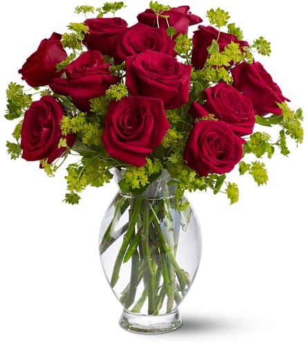 Bouquet of red roses in a clear glass vase