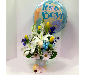 Bouquet with white lilies and daisies, topped by a blue "It's a Boy!" balloon