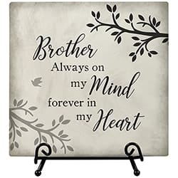 Decorative plaque reading "Brother Always on my Mind forever in my Heart" on a stand