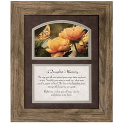 Framed floral memorial plaque with orange flowers and a butterfly