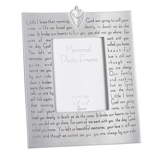 Silver memorial photo frame with engraved text and a heart accent