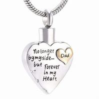 Heart-shaped memorial pendant on a chain with "Dad" text