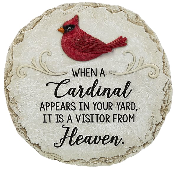 Round memorial plaque with a red cardinal and sympathy text